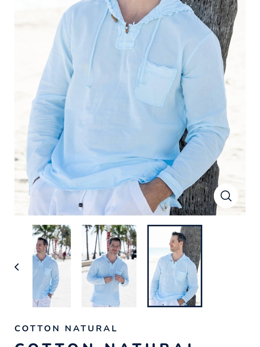 Light Blue Cotton Garment with '100% Cotton' Tag